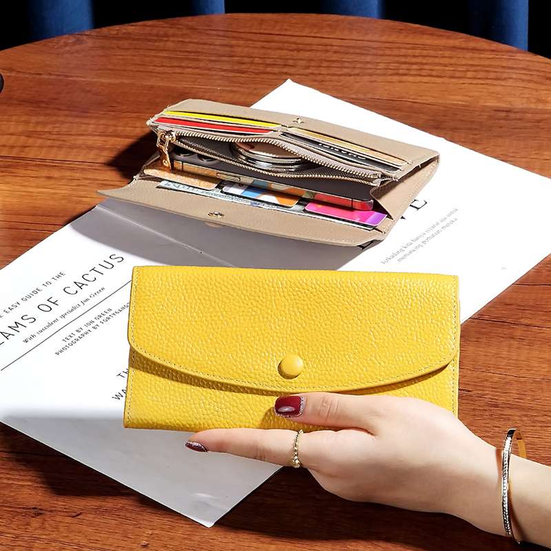 ラウンドフラップのスマート長財布